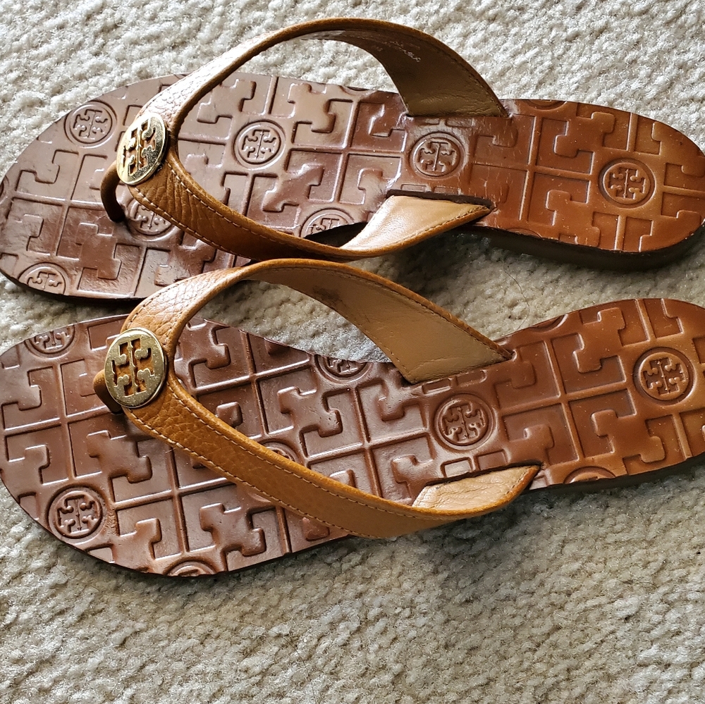 Aithentic Tory Burch thora royal tan flip flops